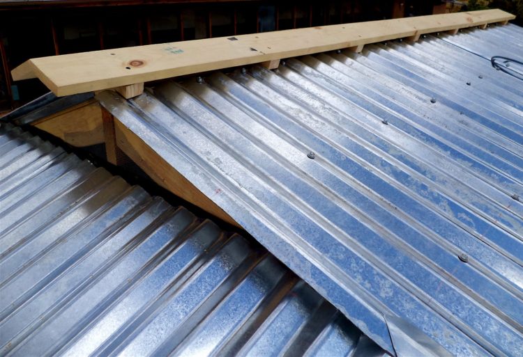 How do you waterproof a corrugated iron roof?