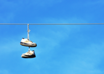 what do shoes on a telephone wire mean