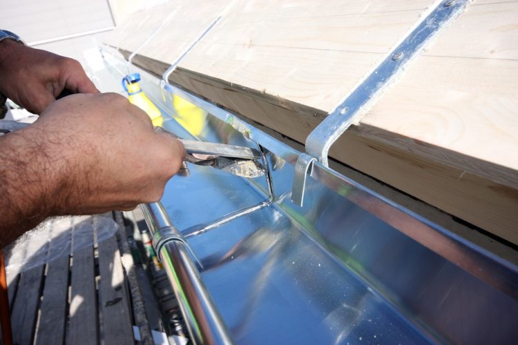 installing metal gutters