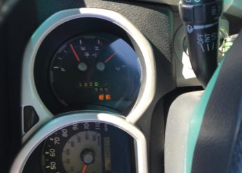What is TRAC off and check engine?