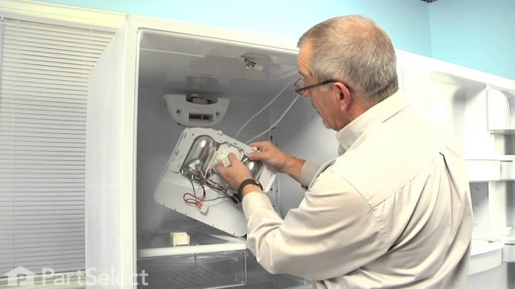 Where is the defrost timer on a whirlpool?