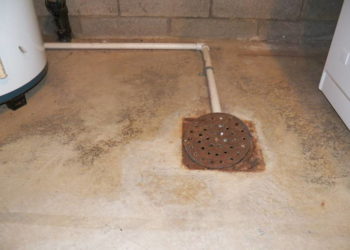 How do you install a floor drain cover?