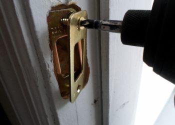 What is a deadbolt strike plate?