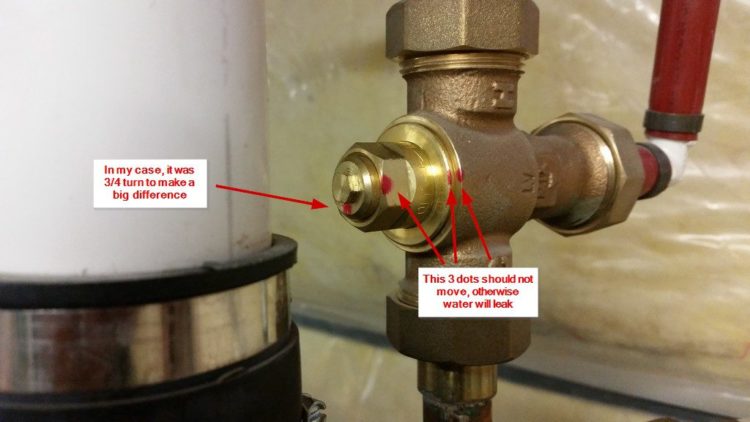How do you adjust an anti scald valve?