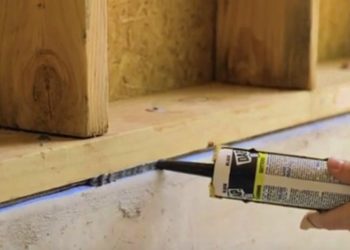 What do you use to seal wood to concrete?