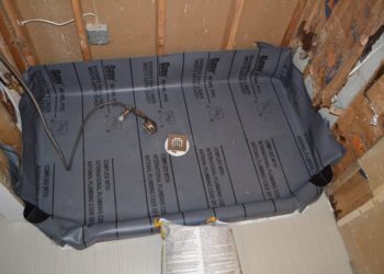 What is the difference between a shower pan and a shower base?