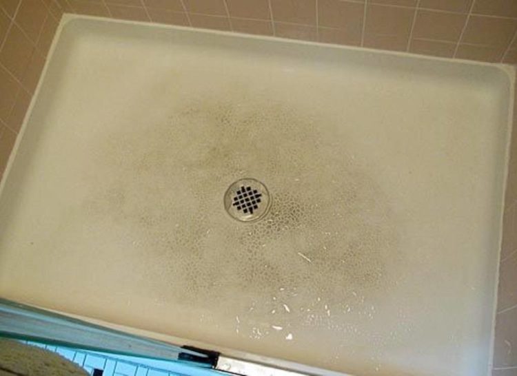 how to clean fiberglass shower