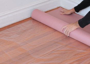 How do you cover a floor with paper?