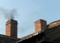 black smoke coming out of chimney