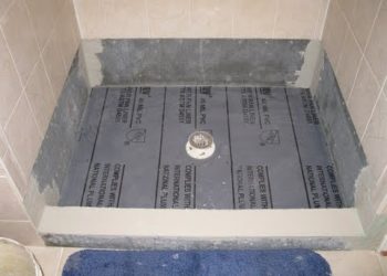 What do you put under shower base?