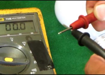 How do you check Christmas lights with a voltage tester?