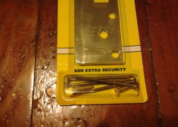 Do longer screws make a door harder to kick in?