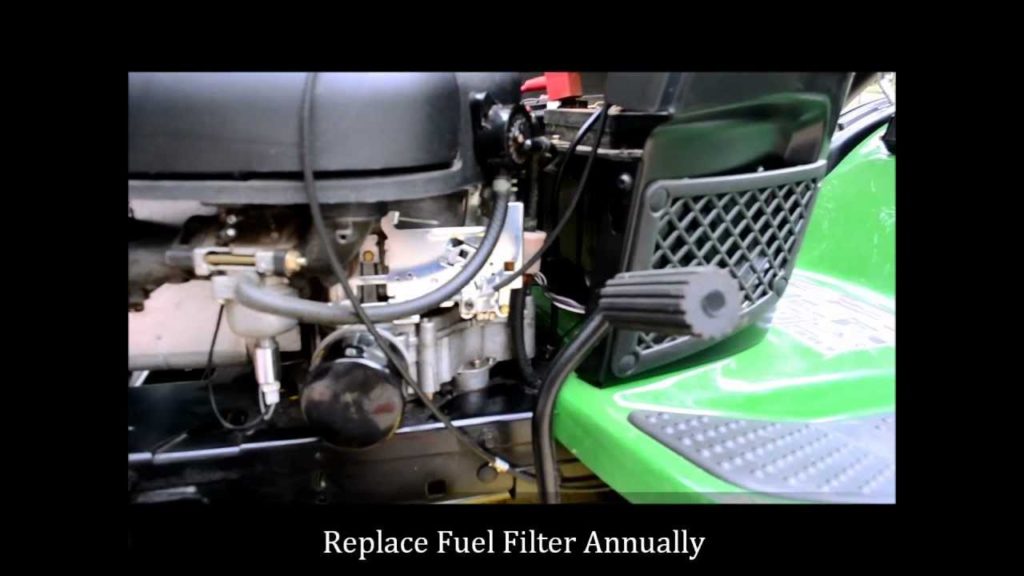 Where is the fuel filter on a John Deere l110?