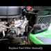 Where is the fuel filter on a John Deere lawn mower?