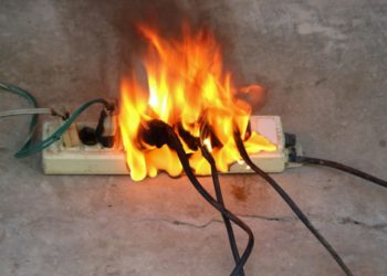 what causes an electrical cord to get hot