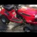 How do you adjust the transmission on a Craftsman riding lawn mower?