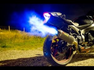 Why does my motorcycle sputter and backfire?
