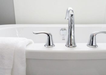 Why does my toilet bubble when I drain the bathtub?