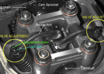 How do you adjust the air intake valve on a gas stove?