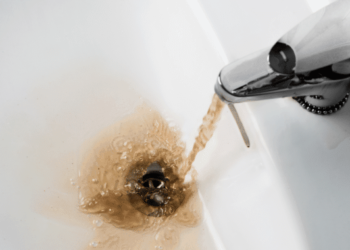 Why is the water from my hot water brown?